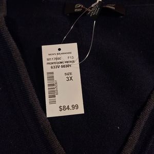 Dress sweater vest color is deep dark blue